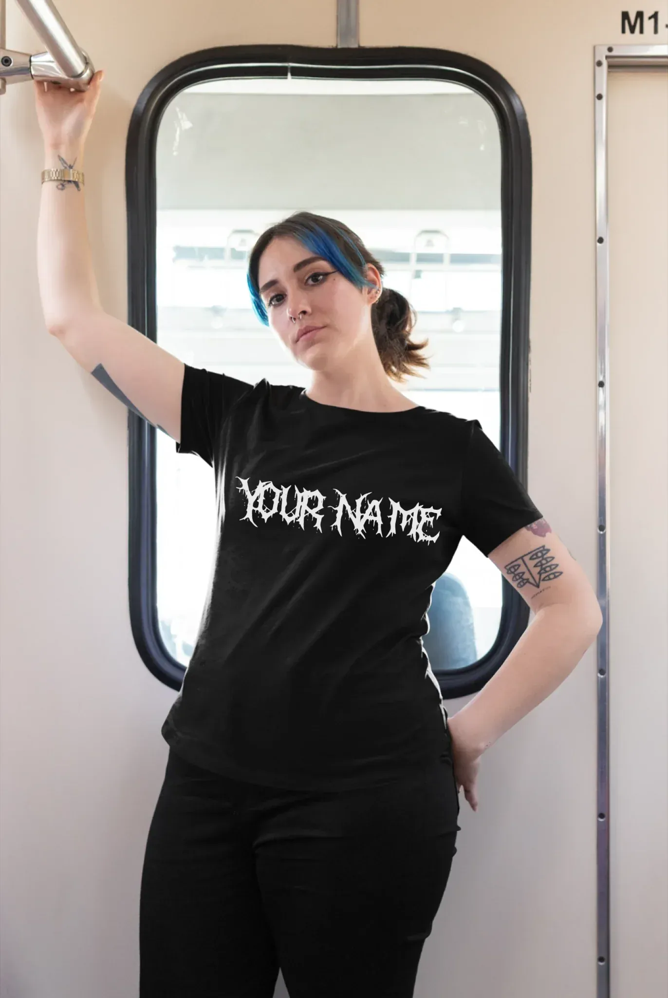 plus-size-tee-mockup-of-a-girl-with-a-nose-piercing-riding-the-train-25470