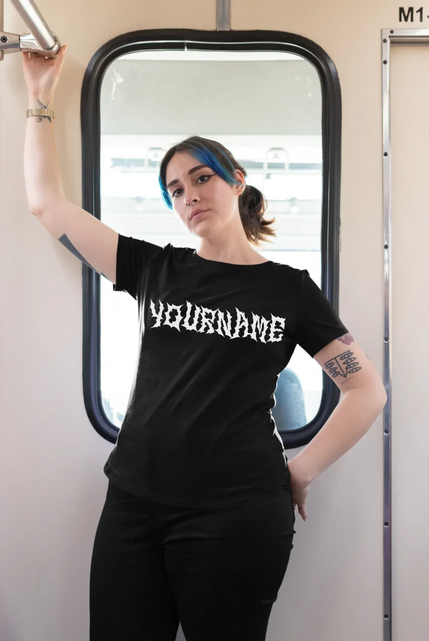 plus-size-tee-mockup-of-a-girl-with-a-nose-piercing-riding-the-train-25470