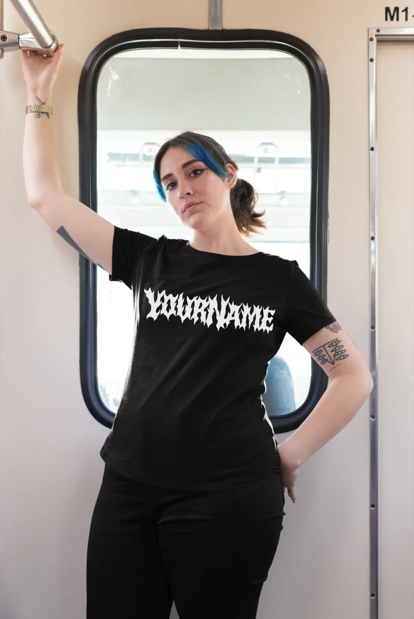 plus-size-tee-mockup-of-a-girl-with-a-nose-piercing-riding-the-train-25470