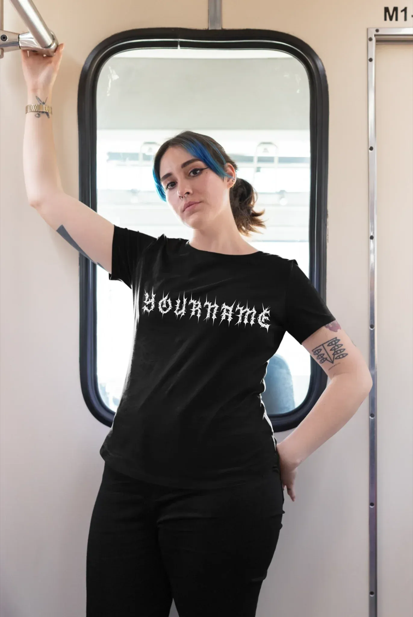 plus-size-tee-mockup-of-a-girl-with-a-nose-piercing-riding-the-train-25470