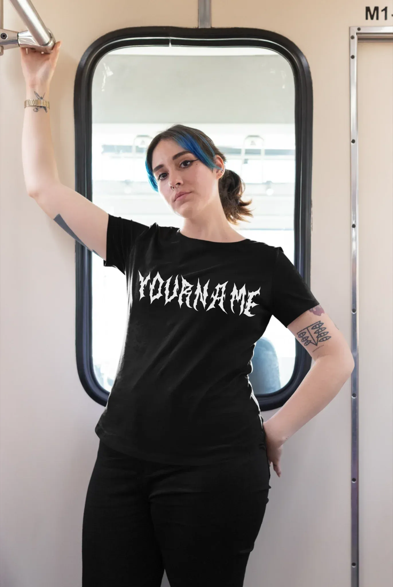 plus-size-tee-mockup-of-a-girl-with-a-nose-piercing-riding-the-train-25470