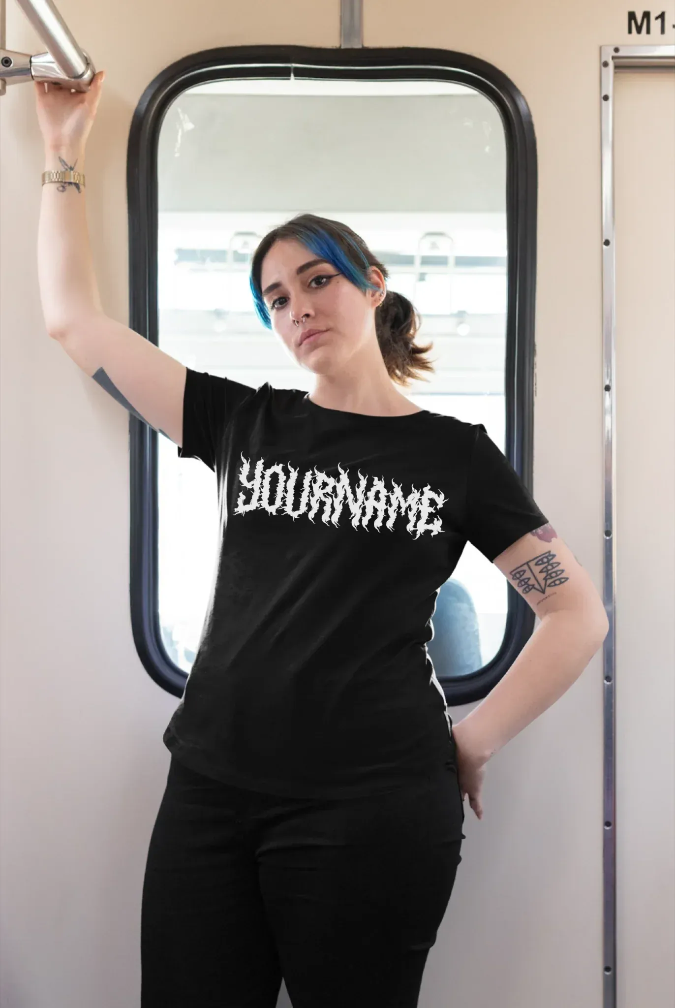 plus-size-tee-mockup-of-a-girl-with-a-nose-piercing-riding-the-train-25470
