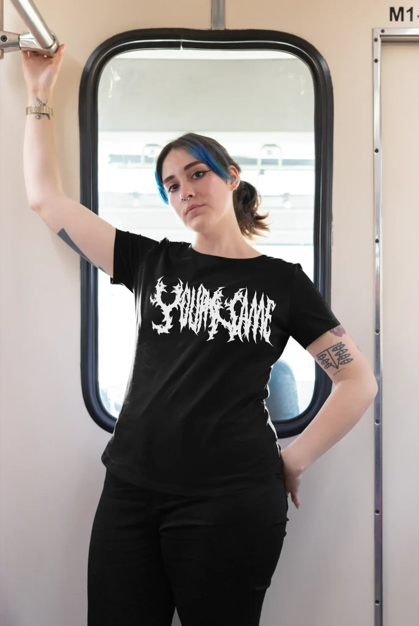plus-size-tee-mockup-of-a-girl-with-a-nose-piercing-riding-the-train-25470